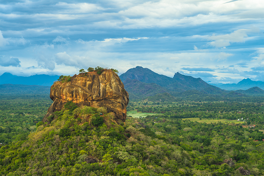 Sigiriya rock fortress rising above the jungle canopy